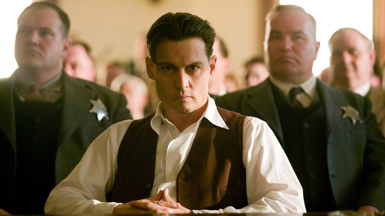 John Dillinger in a court hearing in Public Enemies (2009)