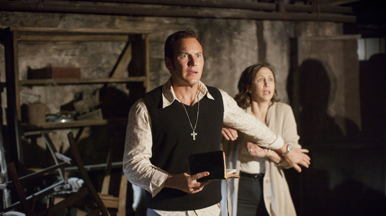 Ed and Lorraine Warren performing an exorcism in 