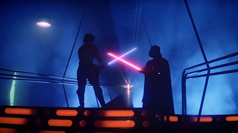 Luke Skywalker and Darth Vader dueling with lightsabers in Star Wars: Episode V - The Empire Strikes back