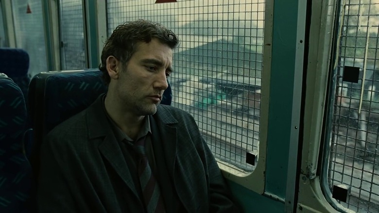 Theo Faron riding a bus in Children of Men