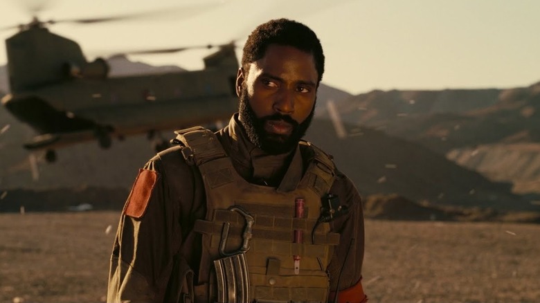 The Protagonist wearing military body armor, preparing for battle in "Tenet" (2020)