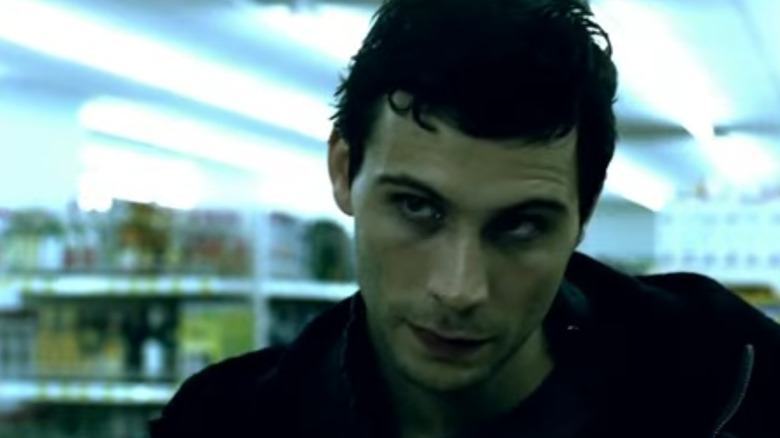 Simon looking nervous and shifty at a grocery store in "Paranoia 1.0" (2004)