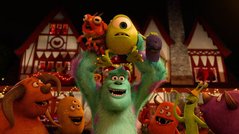 Sully holding up Mike in Monsters University (2013)
