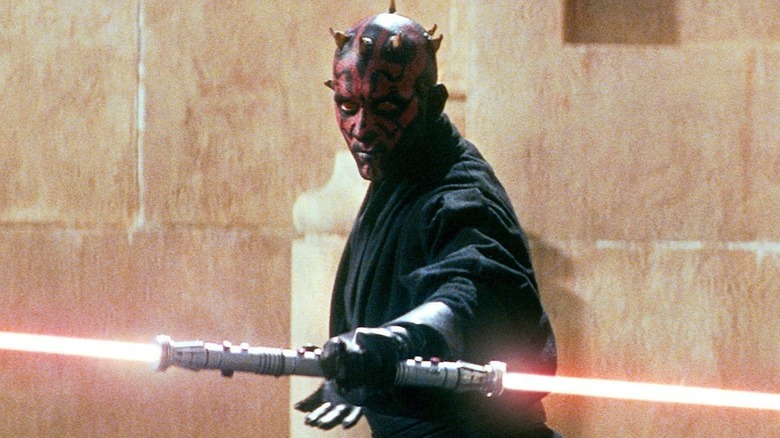 Darth Maul holding a dual lightsaber in "Star Wars: Episode I – The Phantom Menace" (1999)