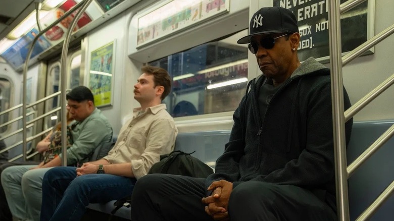 David King riding on a subway train in Highest 2 Lowest (2026)