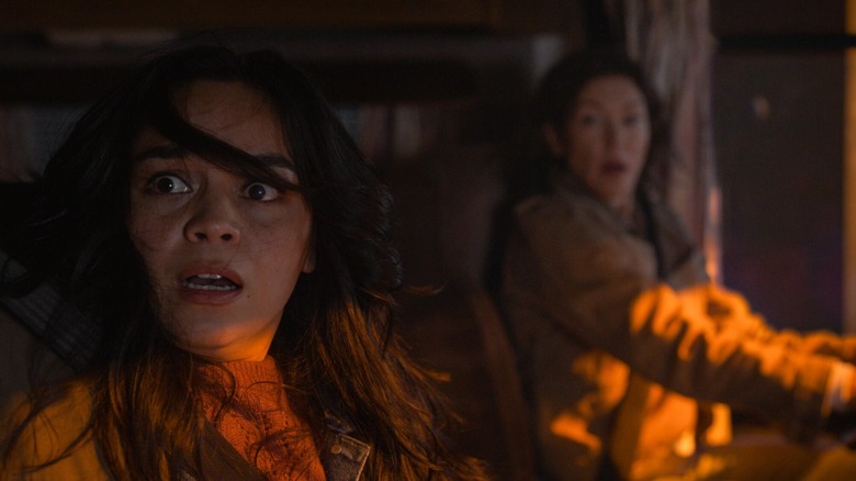Stefani Reyes and her mom witnessing an explosion in Final Destination Bloodlines (2025)
