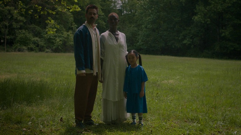 Jake, Kyra, and Mika standing in a field in After Yang