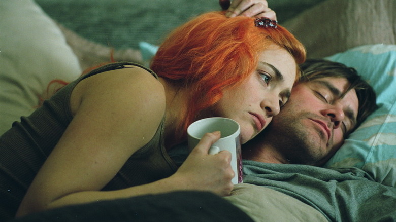Clementine and Joel cuddling in Eternal Sunshine of the Spotless Mind