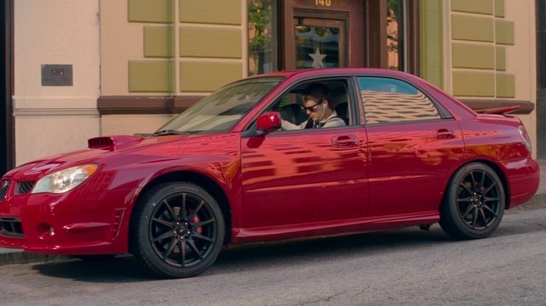 Baby driving a red car in "Baby Driver" (2017)
