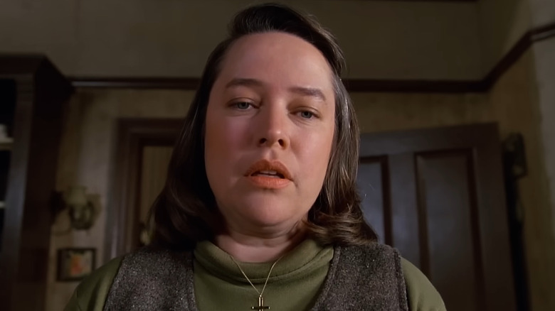 Annie Wilkes looking down at Paul Sheldon in "Misery" (1990)