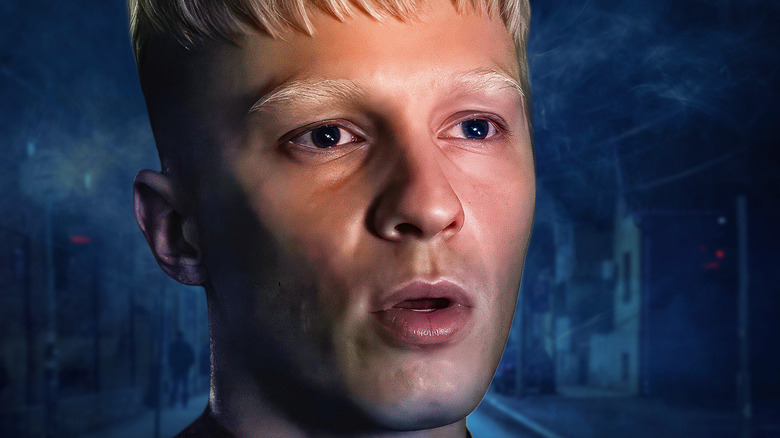 Close-up of Cyrus looking shocked in Onslaught (2026)
