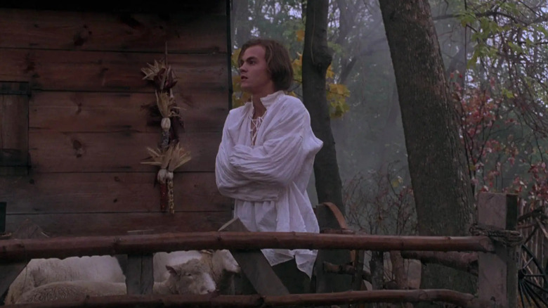 Max Dennison in white shirt on porch