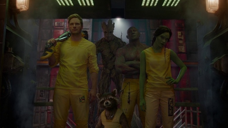Star-Lord, Groot, Rocket Raccoon, Drax, and Gamora standing together in Guardians of the Galaxy