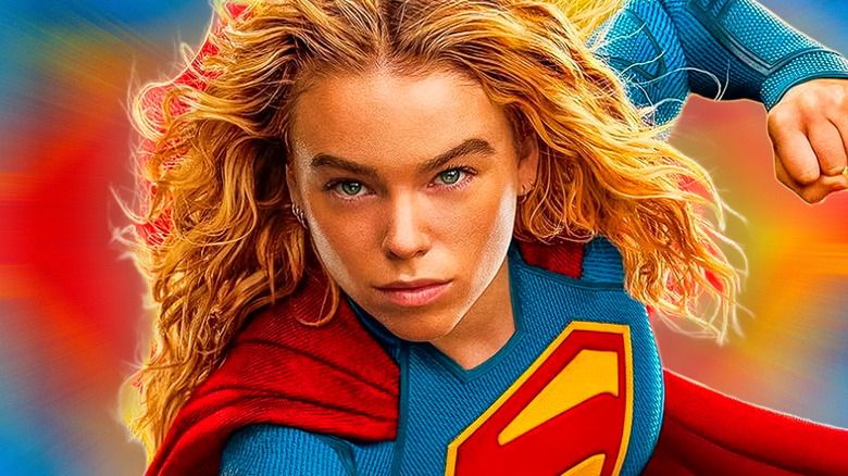 Supergirl against a blue, red, and gold backdrop