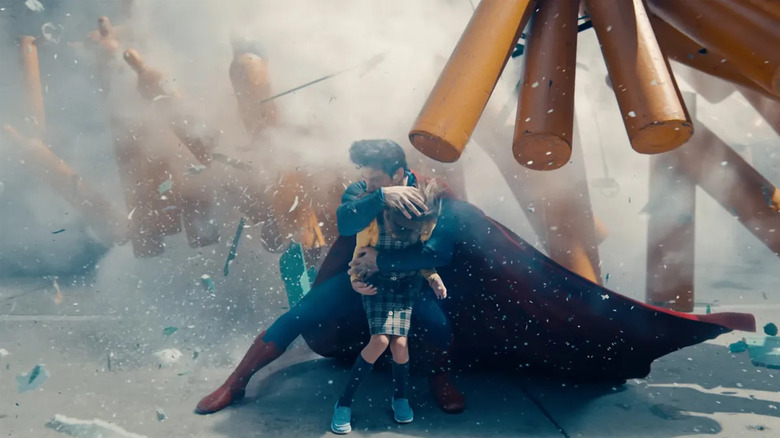 Superman protecting a young girl in Superman