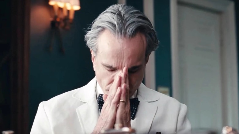 Reynolds Woodcock taking a moment to recuperate in "Phantom Thread" (2017)