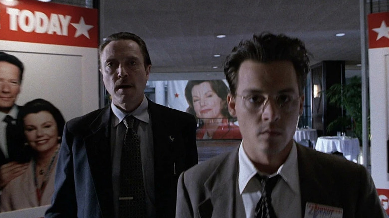 Gene walking with Mr. Smith behind him in Nick of Time