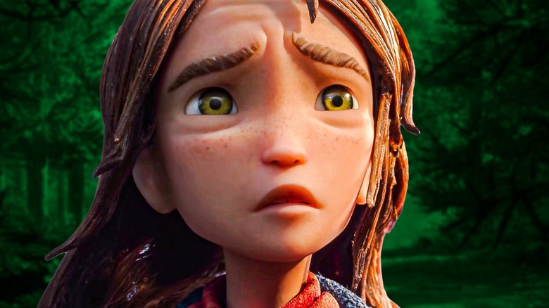 Prue, with mournful expression, before the trees in Wildwood (2026)