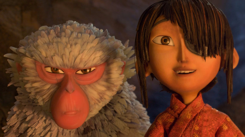 monkey and Kubo on their quest in Kubo and the Two Strings (2016)