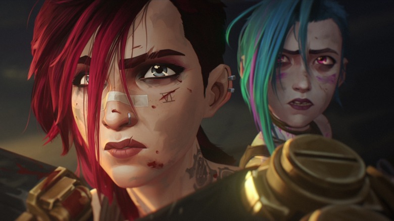 Jinx standing behind Vi in "Arcane: League of Legends"
