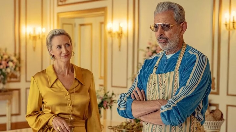 Hera looking at Zeus as he crosses his arms in "Kaos"