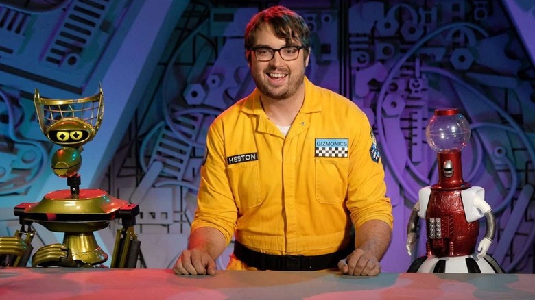 Crow T. Robot, Jonah Ray, and Tom Servo getting into antics on Mystery Science Theater 3000: The Return (2017)
