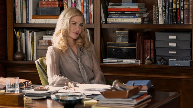 Greer Winbury sitting behind her desk in The Perfect Couple