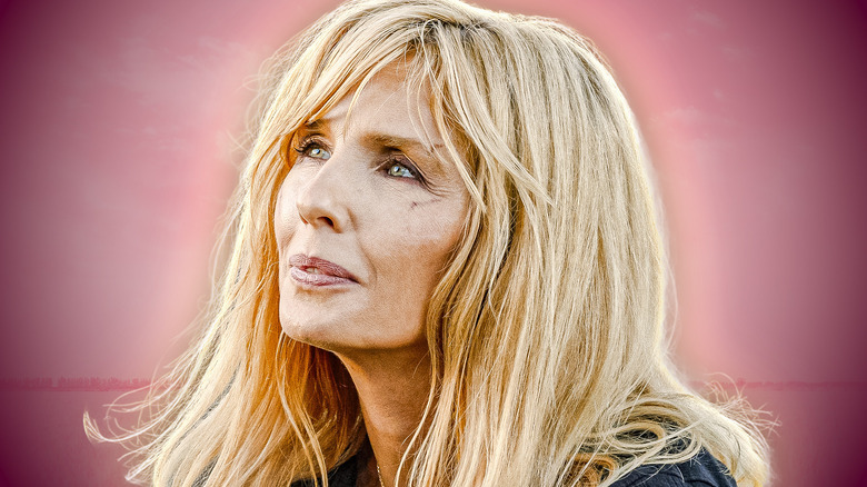 Closeup of Beth in Dutton Ranch with a pinkish background