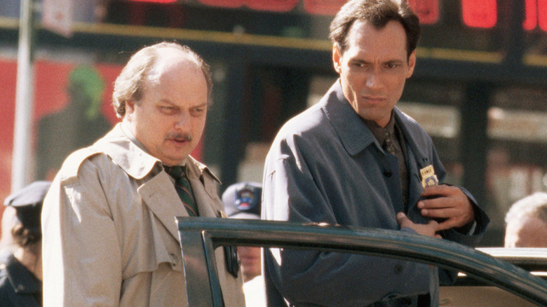 Detectives Andy Sipowicz and Bobby Simone arrive at a crime scene in "NYPD Blue" (1993-2005)