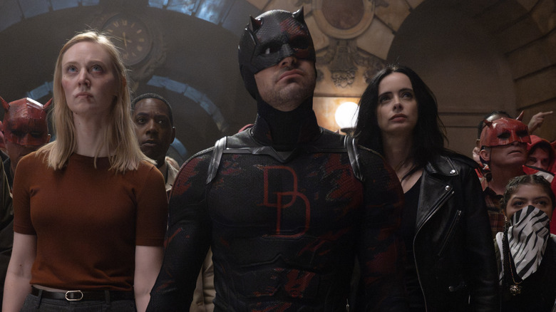 Daredevil, Karen Page, Jessica Jones, and Angela del Toro storming the courthouse on Daredevil: Born Again