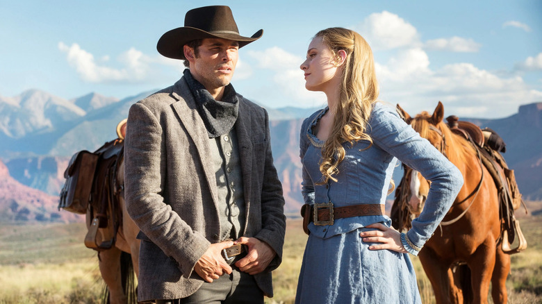Theodore Flood and Dolores Abernathy standing together in Westworld