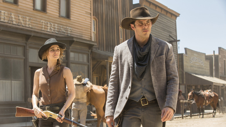 Theodore Flood strolling into town in Westworld