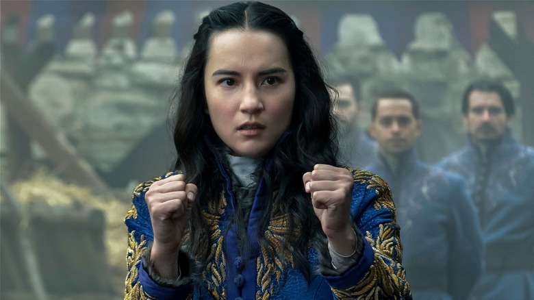 Alina Starkov holding up her fists to fight