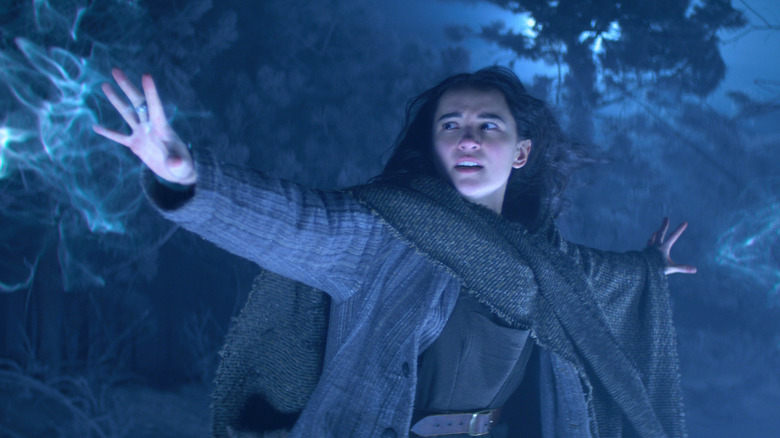 Alina using (and tenuously controlling) her powerful Grisha powers in the forest at night
