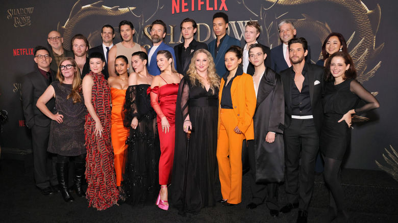 The cast and creators of "Shadow and Bone" posing for a photo at the premiere of Season 1