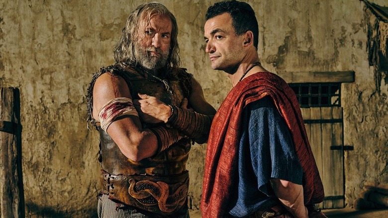 Korris and Ashur having a conference in "Spartacus: House of Ashur"  (2025)