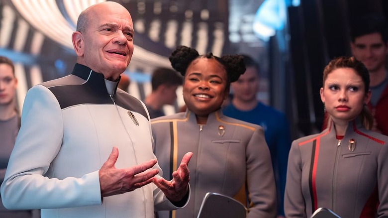 The Doctor, in white uniform, holds court in "Starfleet Academy"