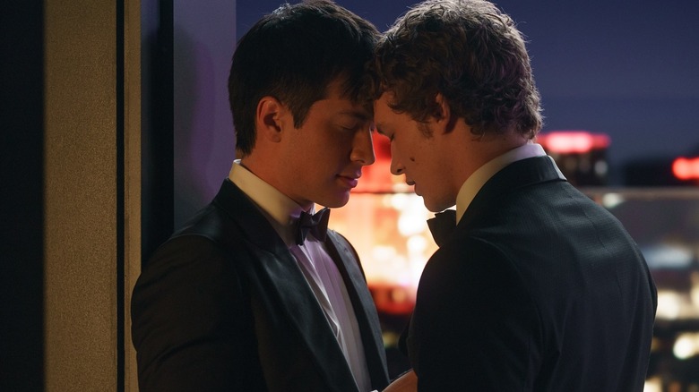 Shane and Ilya about to kiss in tuxedos on Heated Rivalry