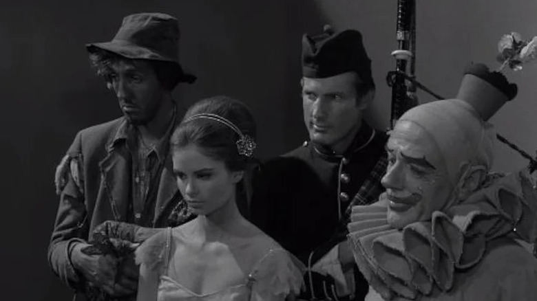 The Hobo, the Ballet Dancer, the Bagpiper, and the Clown looking serious on The Twilight Zone