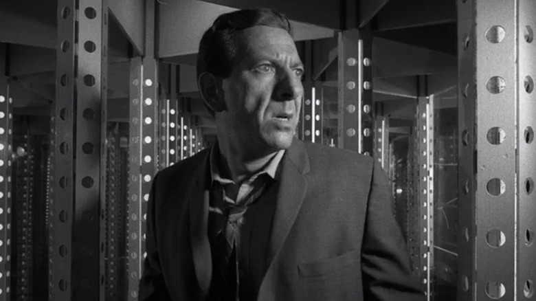 Max Phillips looks confused in a mirror house on The Twilight Zone