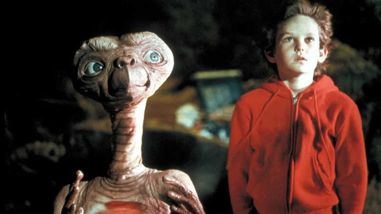 E.T. and Elliott looking shocked in E.T. the Extra-Terrestrial