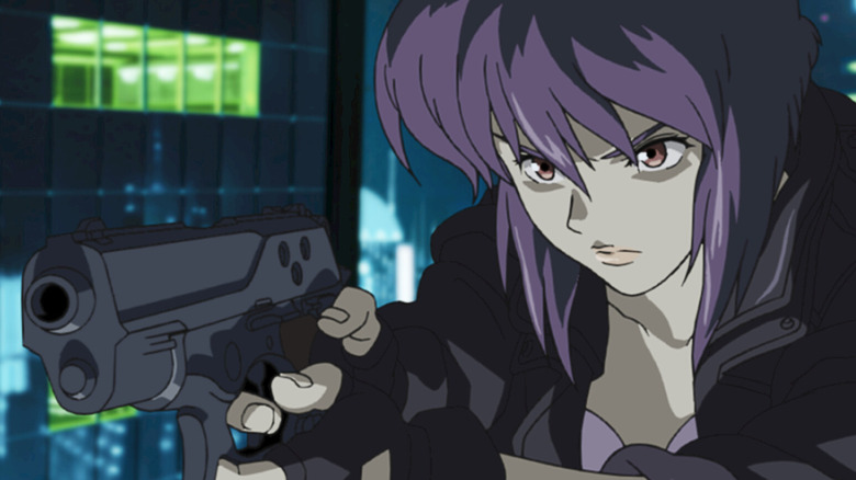 Motoko Kusanagi aiming a gun in "Ghost in the Shell: Stand Alone Complex" (2002-2005)