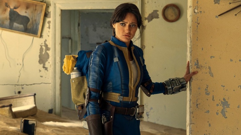 Lucy moving through a ruined building in "Fallout" (2024-present)