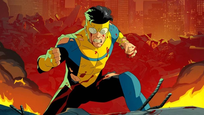 Invincible gearing up for a fight amidst rubble in "Invincible" (2021-present)