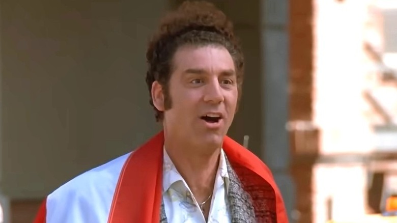 Kramer wearing the Puerto Rican flag around his shoulders