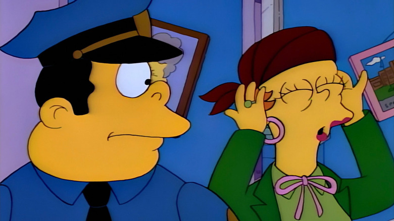 Chief Wiggum looking at Princess Opal on "The Simpsons"