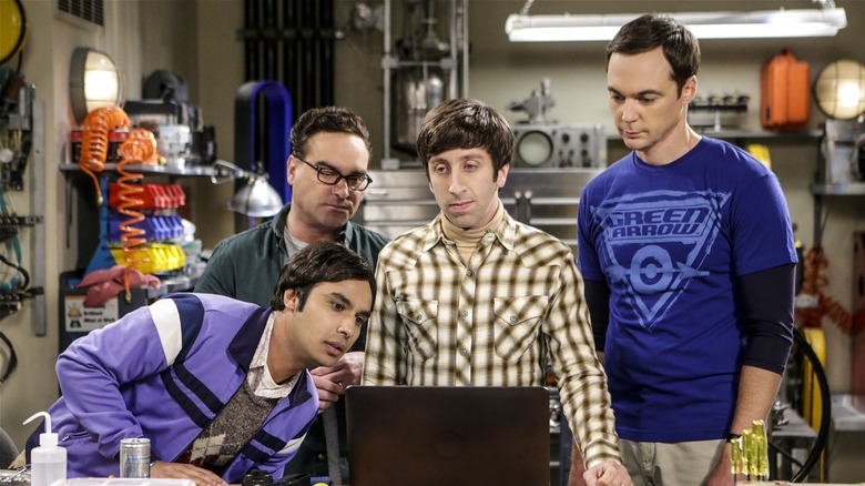 Raj, Leonard, Howard, and Sheldon gathered around a laptop