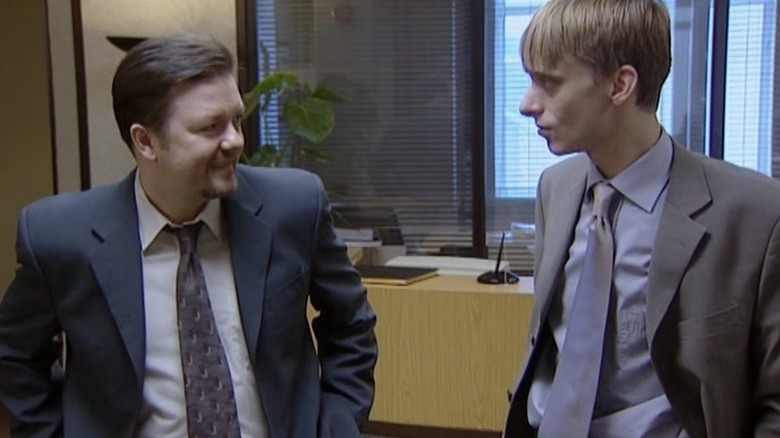 David smiling at Gareth in The Office (2001)
