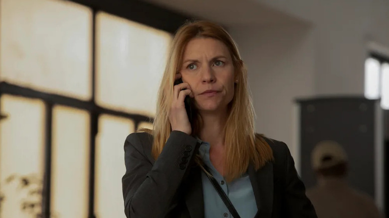 Carrie on the phone frowning in Homeland