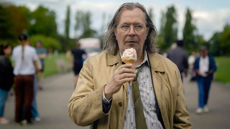 Jackson Lamb walking and eating an ice cream on Slow Horses